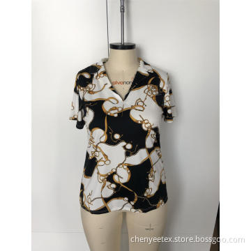 Geometric stitching on a V-neck short-sleeve shirt